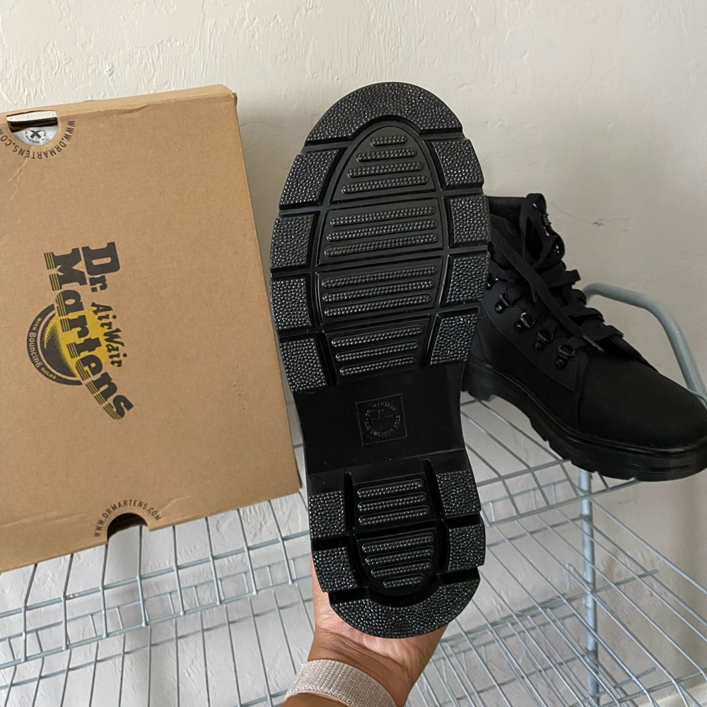 Dr. Marten’s never worn combat boot. Women size 9